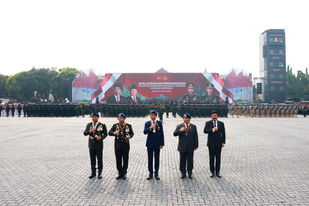 Jokowi and Prabowo Subianto Inspect Troops Together at Presidential Inauguration Security Ceremony in Pindad Jeep